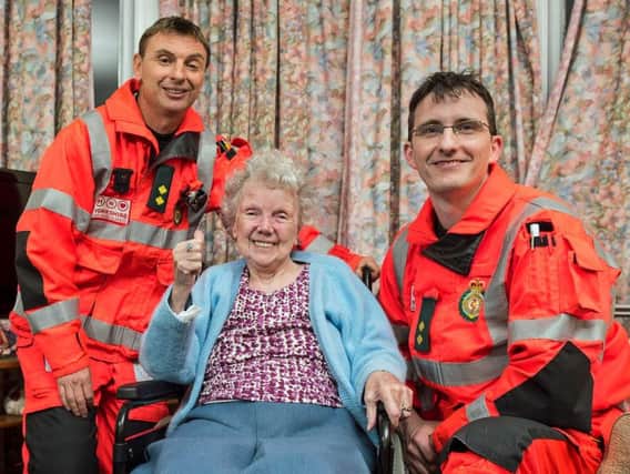 Rose Smiles meets the Yorkshire Air Ambulance paramedics Tony Wilkes (left) and Paul Holmes.