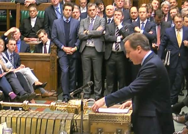 David Cameron addresses MPs on his EU deal.