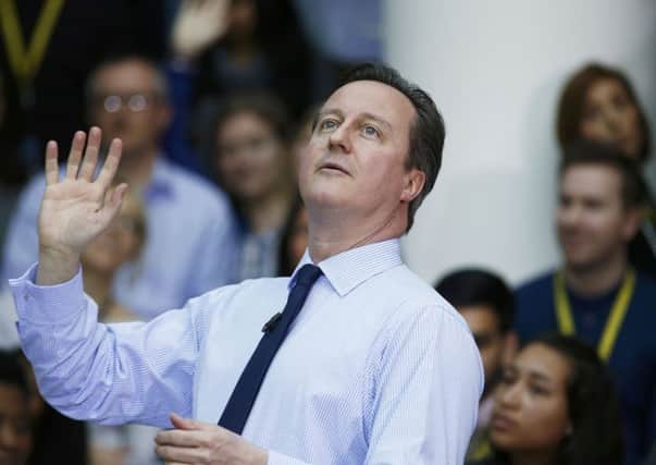 Prime Minister David Cameron answers questions after delivering a speech on the European Union to staff at the headquarters of O2 in Slough, Berkshire.