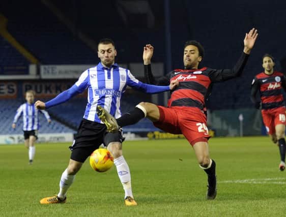Jack Hunt, challenged by QPRs James Perch, says Sheffield Wednesday are a match for anyone in the Championship (Picture: Steve Ellis).