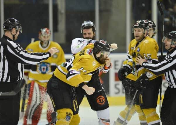 FIGHT NIGHT: Sheffield Steelers' Mathieu Roy tussles with Nottingham Panthers' Robert Farmer. Picture: EIHL.