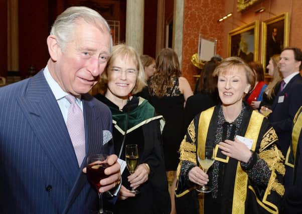 The Prince of Wales with staff from the University of Bradford at a reception after the presentation of The Queen's Anniversary Prizes for higher and further education in Buckingham Palace, London.  Pic: John Stillwell/PA Wire