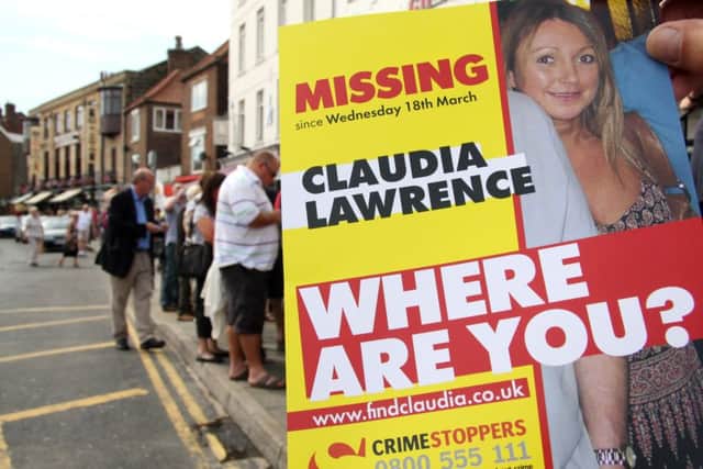 Martin Dales and friends distribute posters and cards for missing Claudia Lawrence in Whitby w093416a