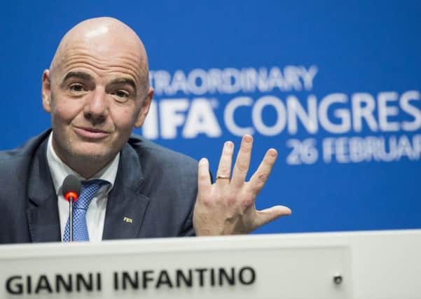 Swiss Gianni Infantino, new FIFA President, smiles during the press conference after being elected. Picture: Ennio Leanza/AP.