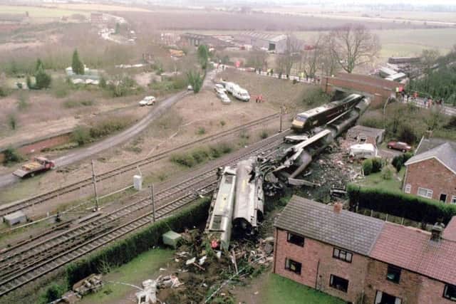 An aerial picturre, taken by the HSE of the disaster showing the coal carrying freight train at rest near houses.