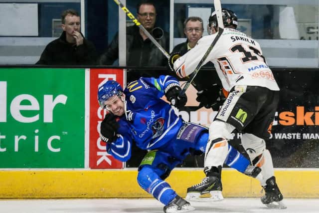Rod Sarich delivers a hit but it was a disappointing night once again for Sheffield Steelers in Coventry. Picture: Scott Wiggins.