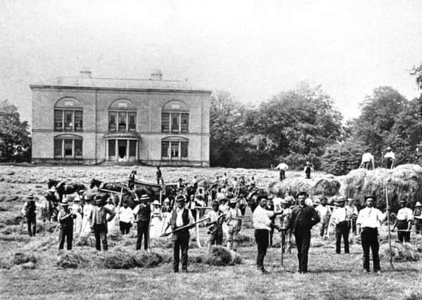 Haymakers on the lawn at Sledmere House in 1888.