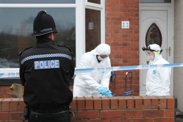 A police forensic team outside 22 Station Road in Shirebrook, where the bodies of two women were found on Friday night. Picture: Ross Parry Agency
