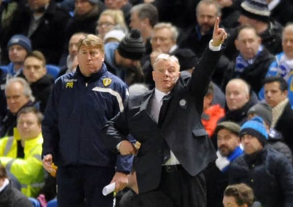Leeds United head coach Steve Evans and assistant Paul Raynor.