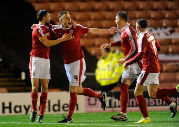 Marc Roberts celebrates scoring his opening goal for Barnsley.   Picture Bruce Rollinson