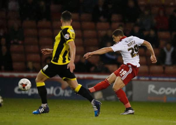 Sheffield United's Che Adams shoots for goal.