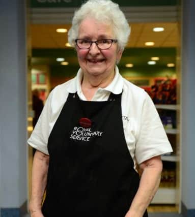 86-year-old Margaret Cawthorne volunteering at the Royal Voluntary Service cafe at Royal Hallamshire Hospital in Sheffield. Picture Scott Merrylees