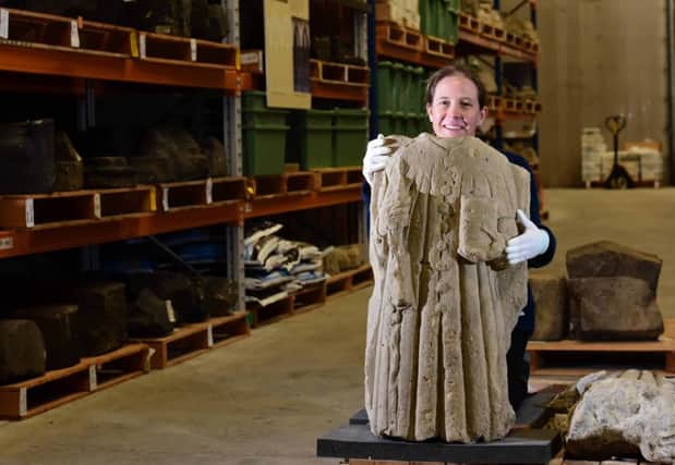 Susan Harrison, Collections Curator at English Heritage with a statue of St James the Great. Picture: Anthony Chappel-Ross