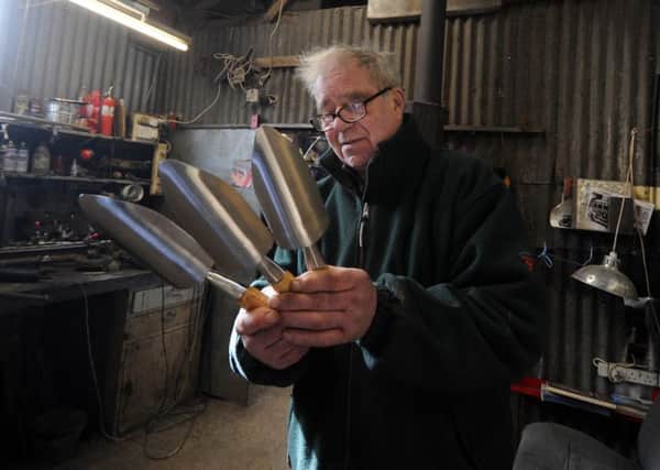 Philip Trevelyn, pictured with some of his trowels.  Picture: Simon Hulme