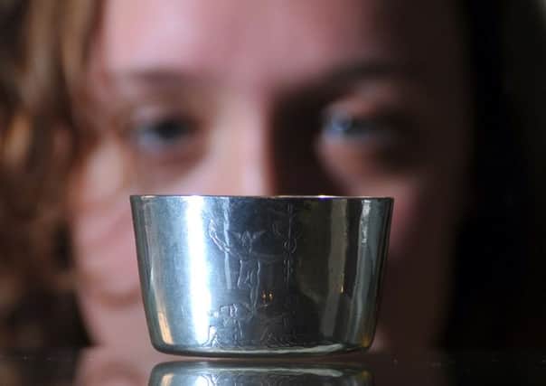 3 March 2016.......    Hull Museums collections assistant Jocelyn Anderson-Wood with the silver Barachin cup stolen from Wilberforce House Museum, Hull.