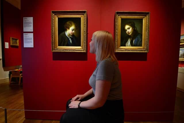 Experience Barnsley's Emily Chalkley with 'L'Ecolier' and 'La Polonaise' by Jean Baptiste Greuze , two of a number of works on show at their new exhibition, 'Meet the Harveys' which aims to inform visitors more about one of the towns most influential and generous families. Picture Scott Merrylees