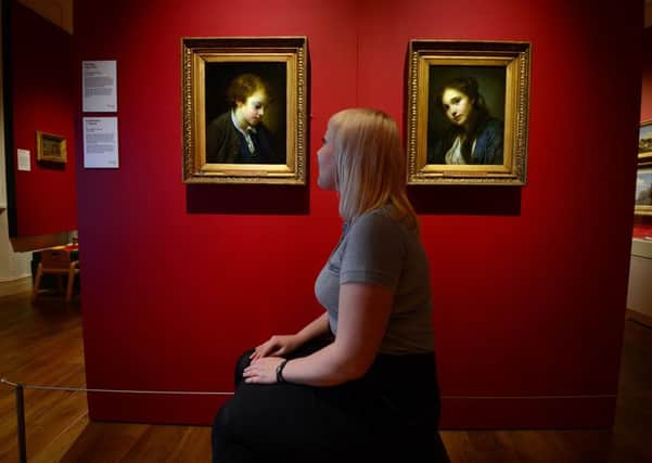 Experience Barnsley's Emily Chalkley with 'L'Ecolier' and 'La Polonaise' by Jean Baptiste Greuze , two of a number of works on show at their new exhibition, 'Meet the Harveys' which aims to inform visitors more about one of the towns most influential and generous families. Picture Scott Merrylees