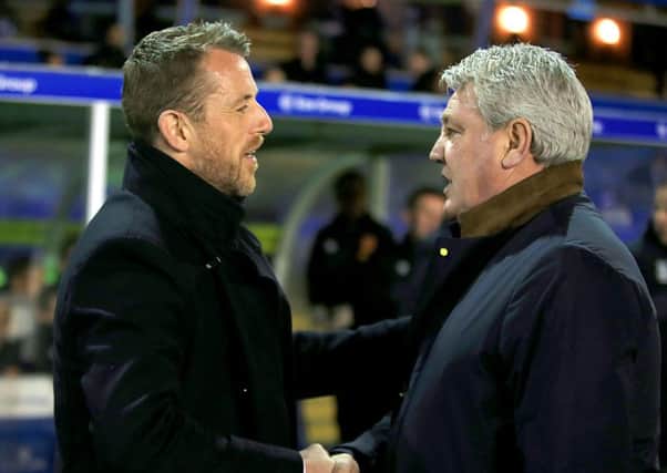 Birmingham City manager Gary Rowett (left) and Hull City manager Steve Bruce. Picture: PA.