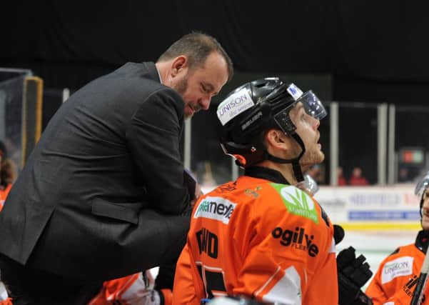 Paul Thompson, with Sheffield Steelers' forward Robert Dowd during last November's clash with Nottingham Panthers. Picture: Dean Woolley.