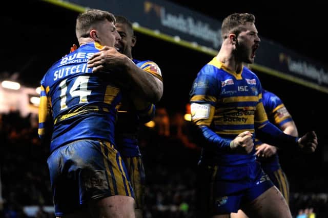 Leeds Rhinos celebrate Liam Sutcliffe's try against Huddersfield Giants at Headingley  Picture: Bruce Rollinson