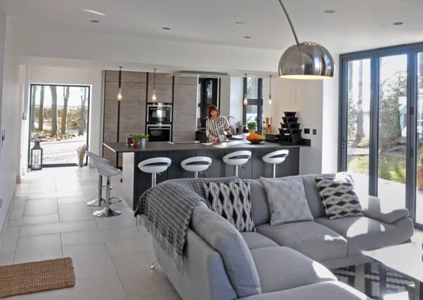 The ground floor living kitchen with units, worktops and appliances from Leeds-based Arlington Interiors