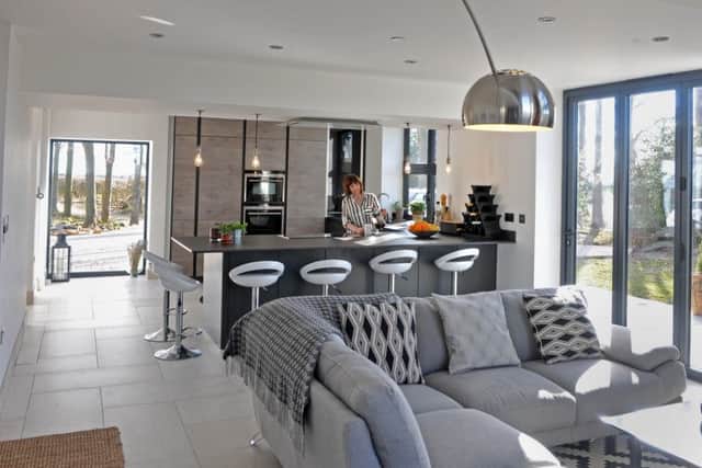 The ground floor living kitchen with units, worktops and appliances from Leeds-based Arlington Interiors