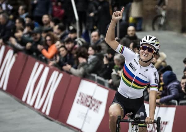 Britain's Lizzie Armitstead celebrates after winning the Strade Bianche (White Roads) cycling race, in Siena, Italy, on Saturday, March 5, 2016. (Angelo Carconi/ANSA via AP)