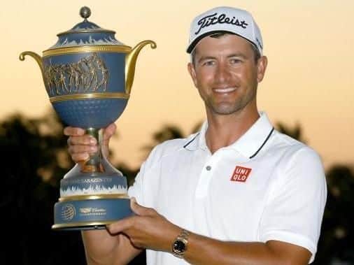 Adam Scott with the WGC-Cadillac Championship trophy (Picture: AP/PA Images).