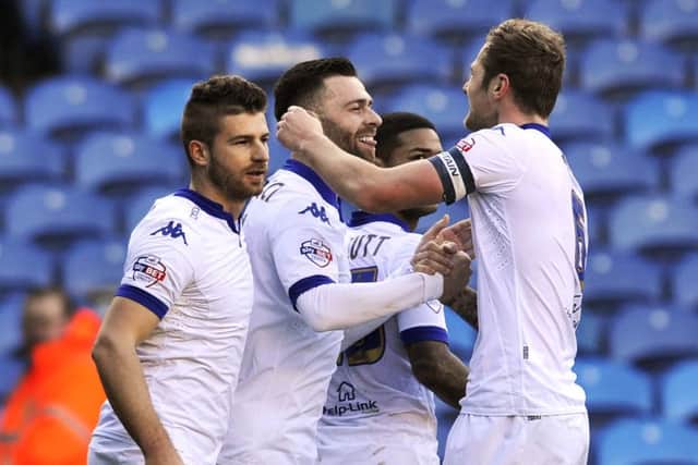 Mirco Antenucci celebrates his opening goal against Bolton on Saturday with Liam Cooper.
 Picture: Bruce Rollinson