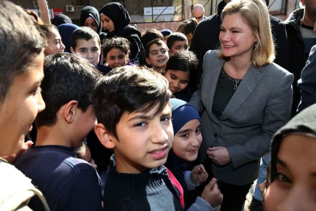 Secretary of State for International Development Justine Greening (right), during a tour of the Bourj Hammoud School, a mixed school teaching Lebanese and Syrian children in Beirut