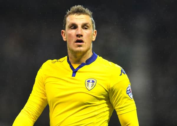Leeds United stirker Chris Wood could be fit enough to be on the bench tonight at Cardiff.