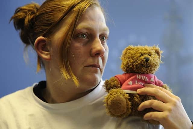 Shannon Matthews' mother Karen holds her daughter's teddy bear as she makes an appeal for her daughter's return during the kidnap saga.