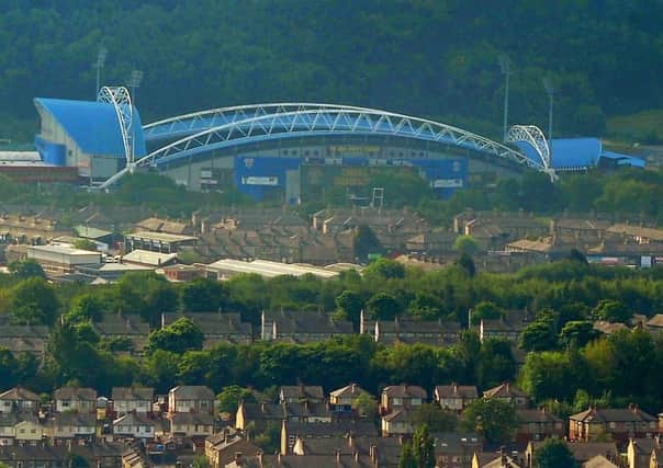 The John Smith Stadium nestles in the hills above the houses of Huddersfield. Picture by Tony Johnson
