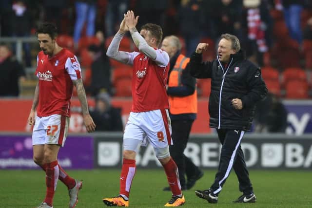 Rotherham United manager Neil Warnock, right, celebrates with his players after Tuesday night's 1-0 win over Middlesbrough. Picture: PA.