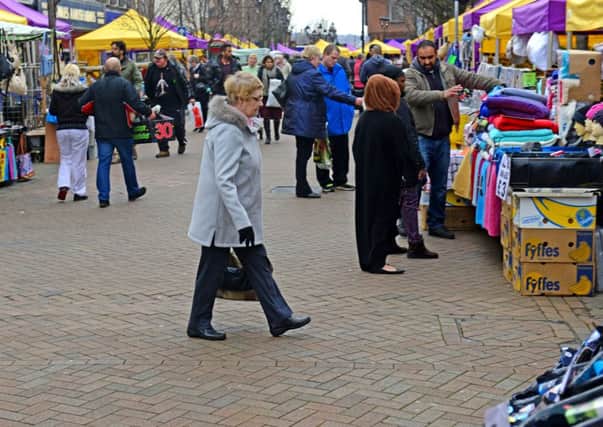 Shoppers in Rotherham market this week.
