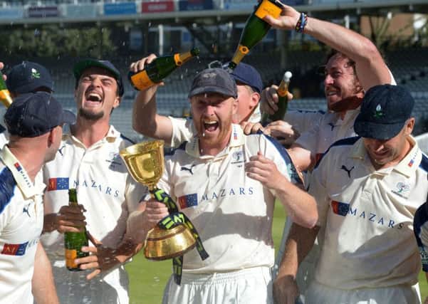 Yorkshire captain Andrew Gale lifts the County Championship trophy at Lord's last year. Picture: Anthony Devlin/PA.