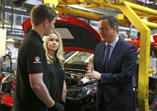 Prime Minister David Cameron meets workers during a visit to  Vauxhall's Ellesmere Port plant before making a speech about the benefits of Britain staying in the EU.