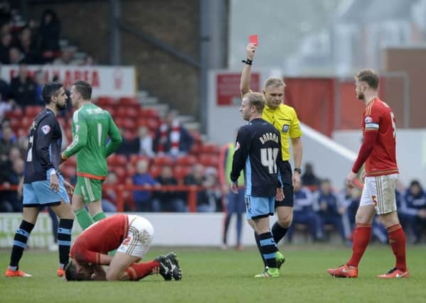 Red card for Owls' Barry Bannan.
