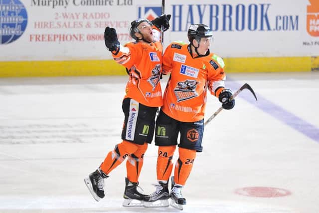 Ben O'Connor celebrates his first goal against Coventry with Jace Coyle. Picture: Dean Woolley.