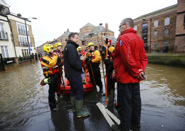 David Cameron on a fleeting goodwill visit to York during the floods.