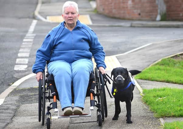 Bobbie Hubbard-Marks and her Support Dog Poppy will compete with Wheels in Motion at an internation wheelchair dance compeition next weekend.. Picture Scott Merrylees