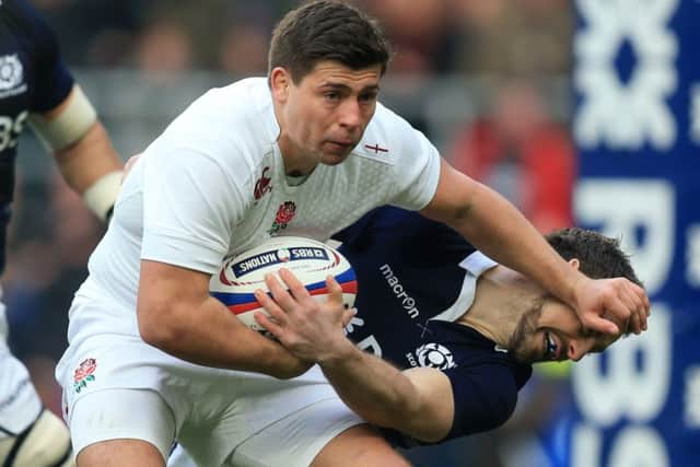 England's Ben Youngs is tackled by Scotland's Tommy Seymour