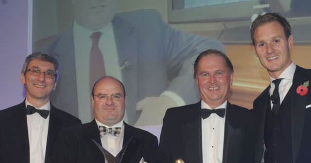 PTSG was one of the winners at The Yorkshire Post Excellence in Business Awards in 2013. This library image shows the team from PTSG picking up the trophy for triumphing in the  Companies with a Â£10-50M category.  From the left, Gordon Singer, of PWC, Paul Teasdale and John Foley of PTSG, are pictured with the host, Dan Walker.
