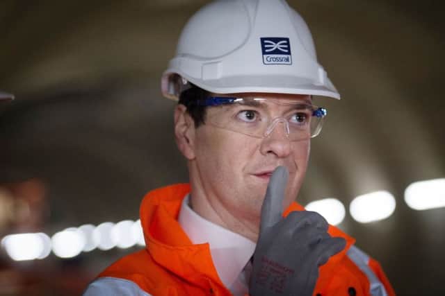 Chancellor George Osborne visits the Crossrail station construction site at Tottenham Court Road in central London