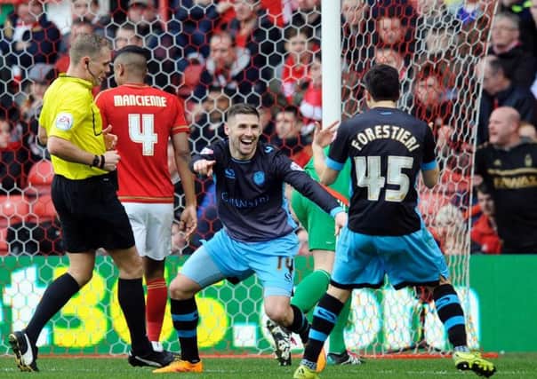 Gary Hooper celebrates scoring Sheffield Wednesday's second goal against Nottingham Forest