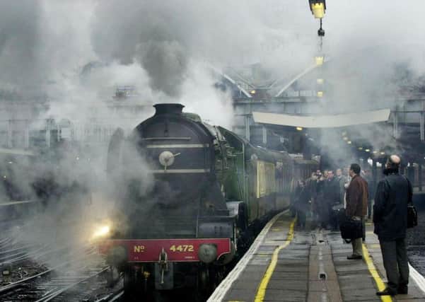 The Flying Scotsman leaves London's Victoria Station  March 13 2002, on the day Flying Scotsman PLC was floated on the stock exchange.