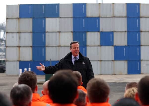 Prime Minister David Cameron speaks to workers during a visit to Felixstowe Port in Suffolk as part of the Remain campaign.