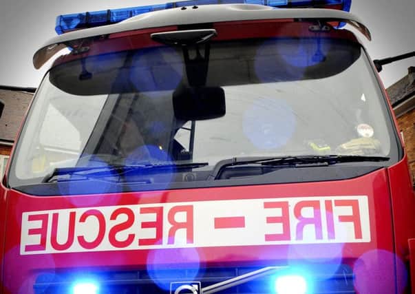 A woman escaped unhurt after fire fighters were called out to tackle a blaze at a five-storey property in Washington.