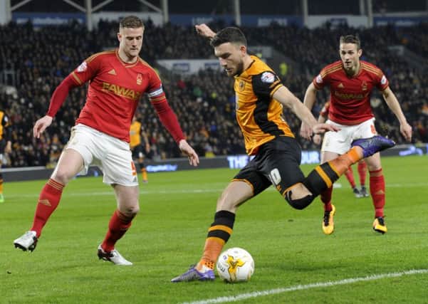 Robert Snodgrass, seen preparing to cross against Nottingham Forest, is confident Hull City can capture an automatic promotion place (Picture: Bruce Rollinson).