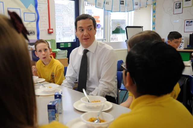 Chancellor George Osborne speaks to pupils at St Benedict's Catholic Primary School in Garforth, Leeds, on the day after he delivered his Budget Statement.  Picture by Simon Hulme